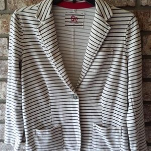 A soft beige and black accent  jacket